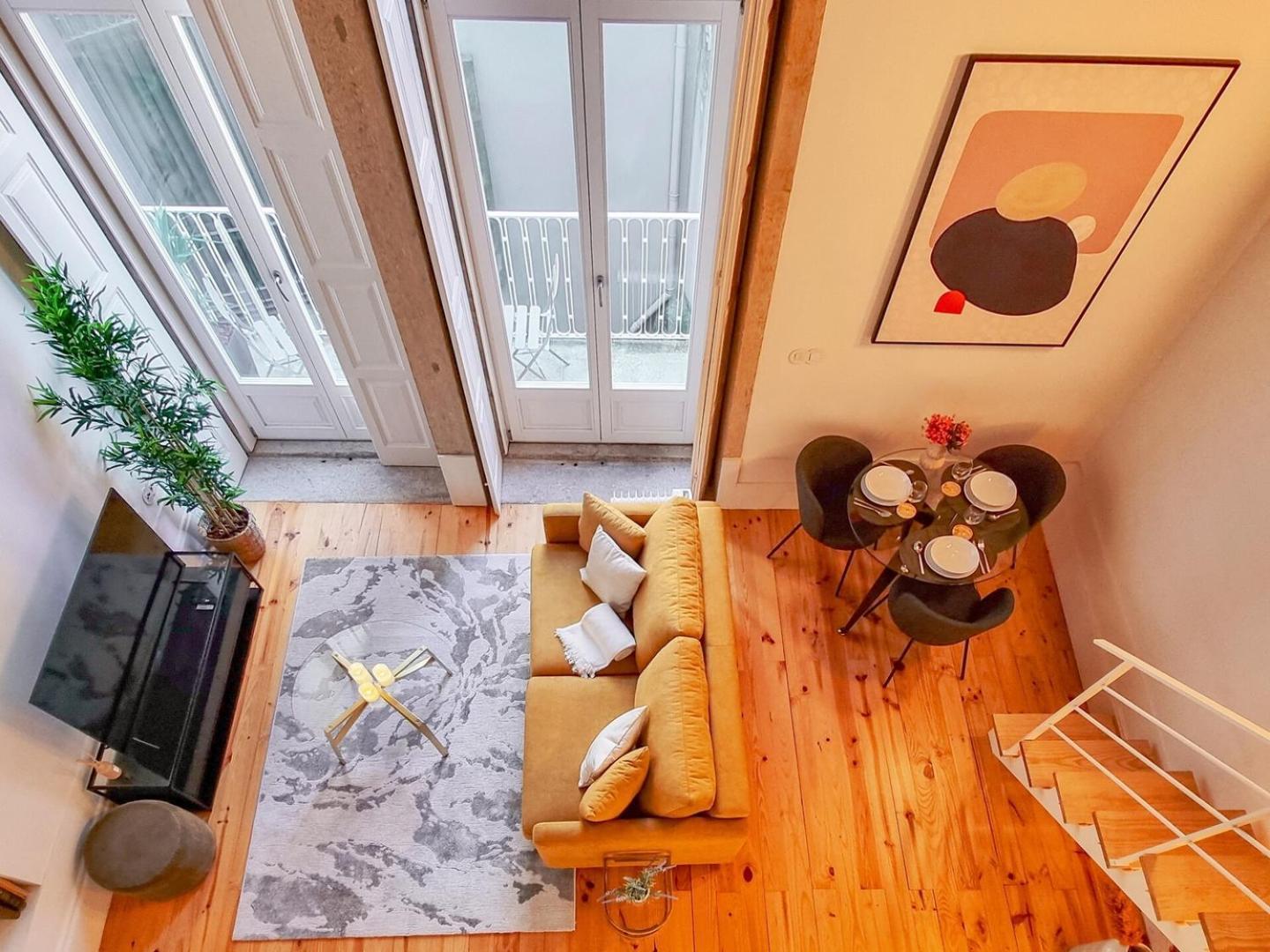 Loft With Balcony On City's Important Street