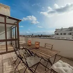 City Center Grand Apartment With Seaview Terrace By Vacationy