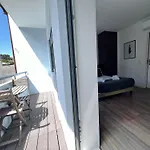 Almada Studios & Suites