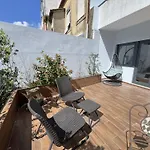 Almada Studios & Suites