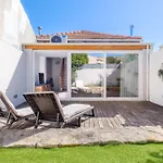 Green Tiles House