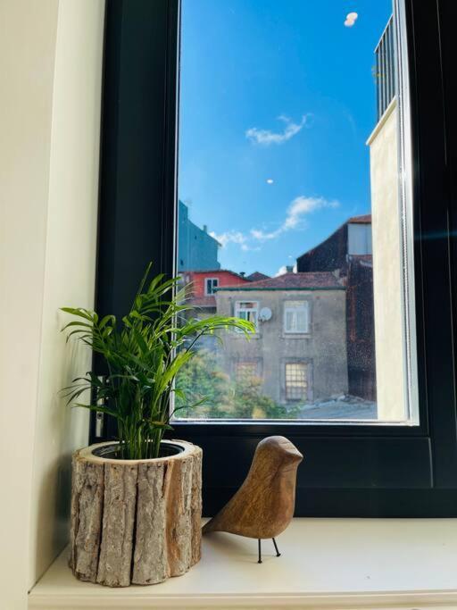 With Balcony In The Center Of Porto