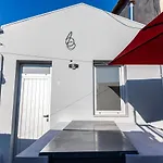House On A Rustic Island At Campanha Trainstation