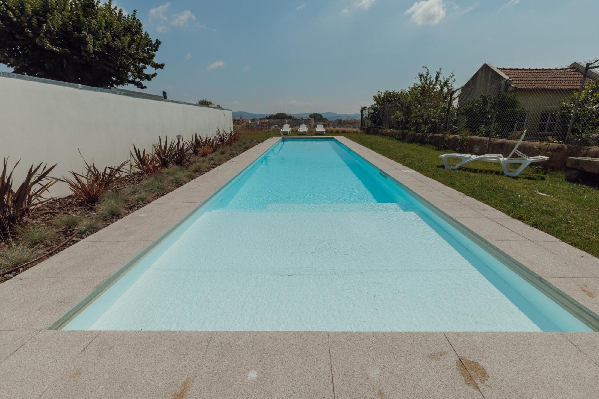 With A Pool By Vacationy Apartment