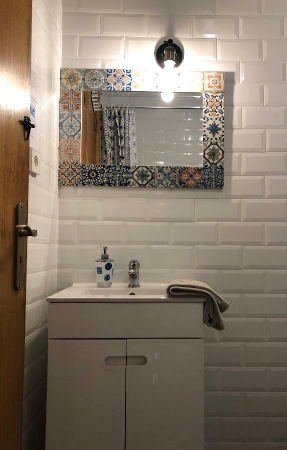 Gasthuis Tiles Porto