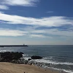 Enjoy A Beautiful Sunset In Porto